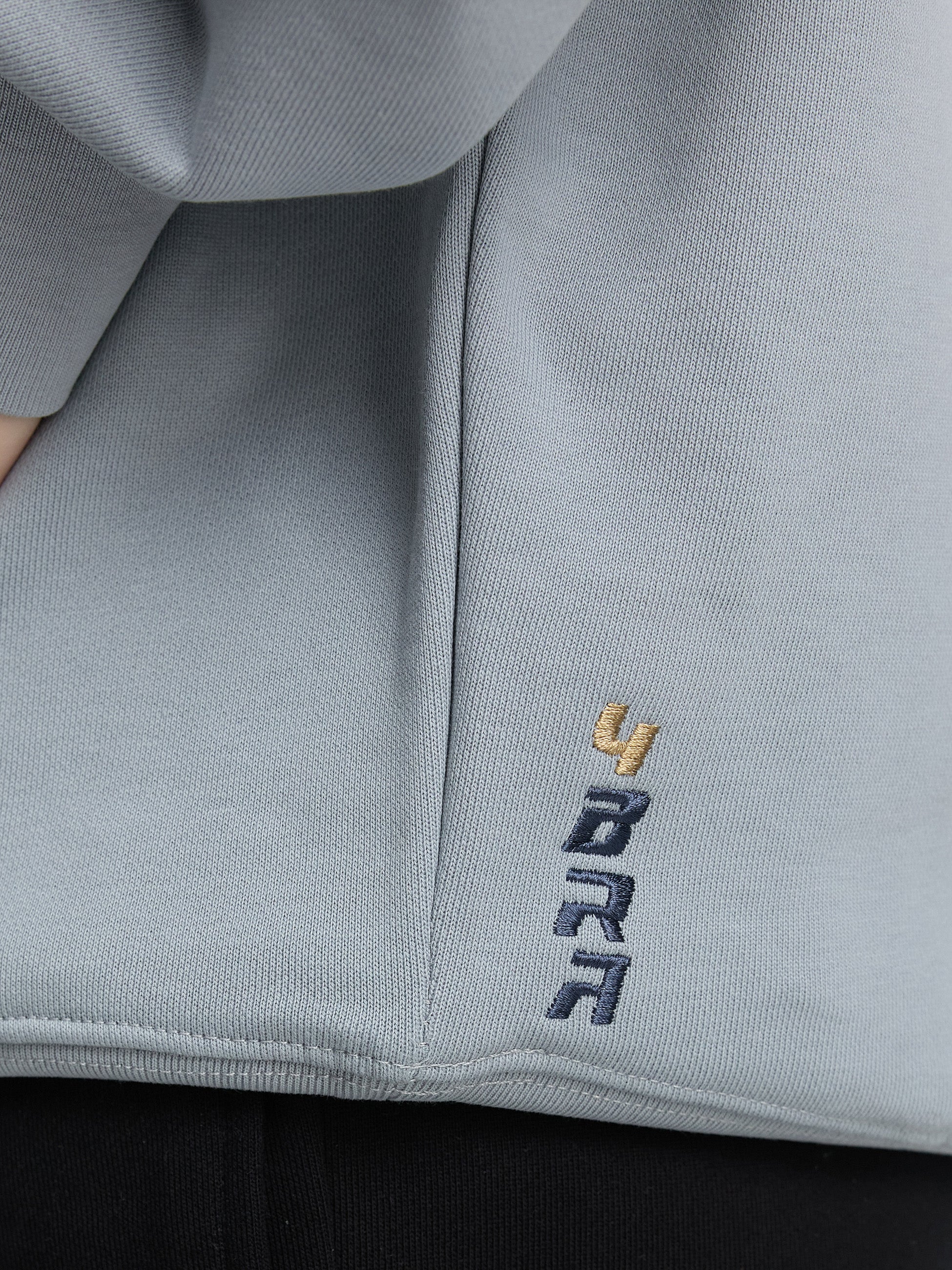 Premium hoodie in mint nahaufnahme mit logo