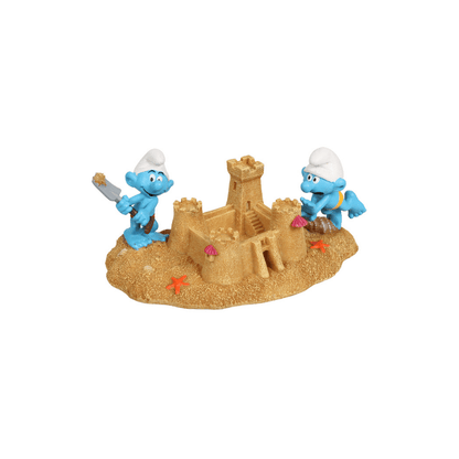 Schlümpfe bauen eine Sandburg Figur