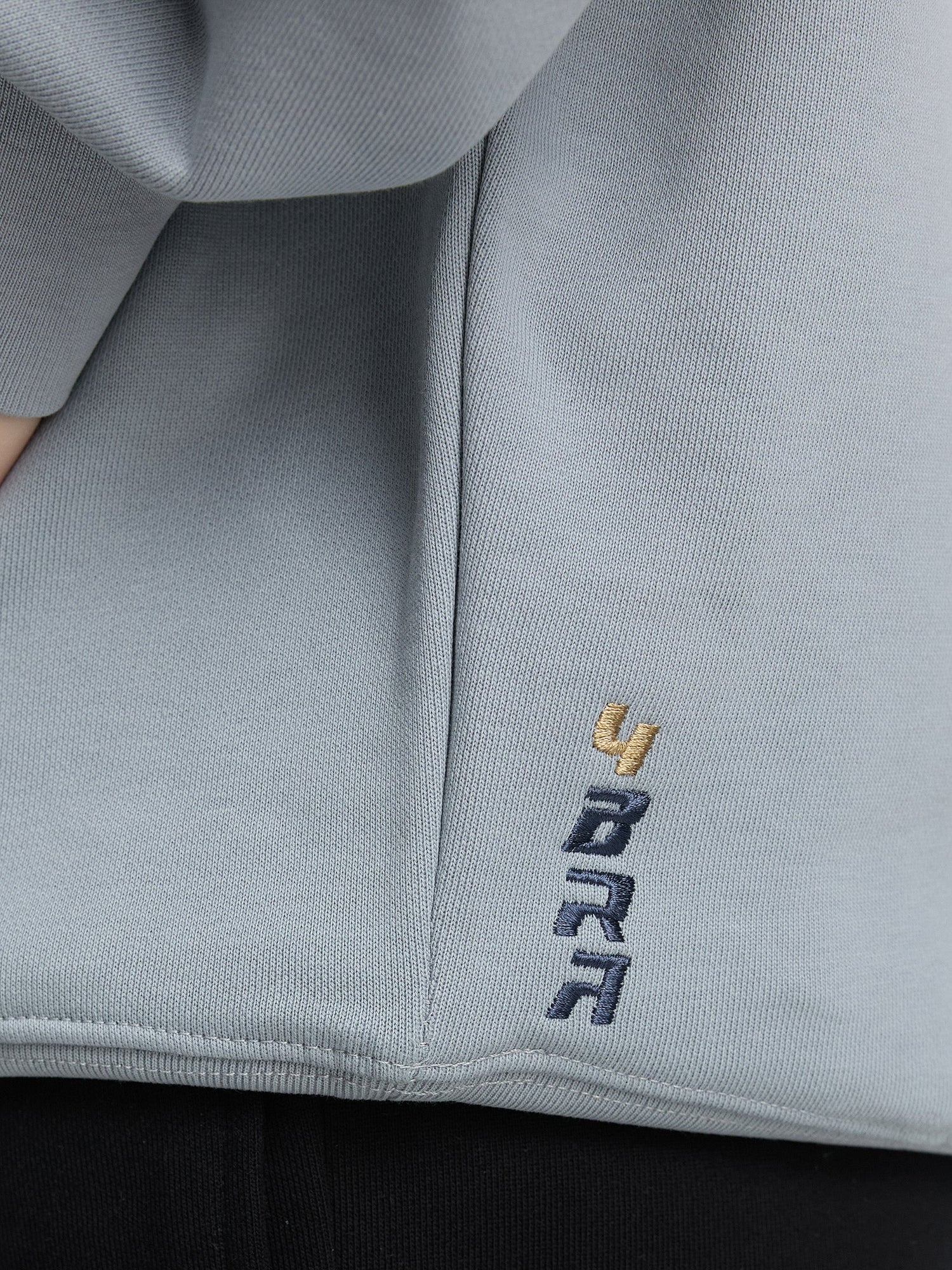 Premium hoodie in mint nahaufnahme mit logo